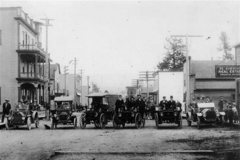 Early automobiles on a Merritt street, historic photograph