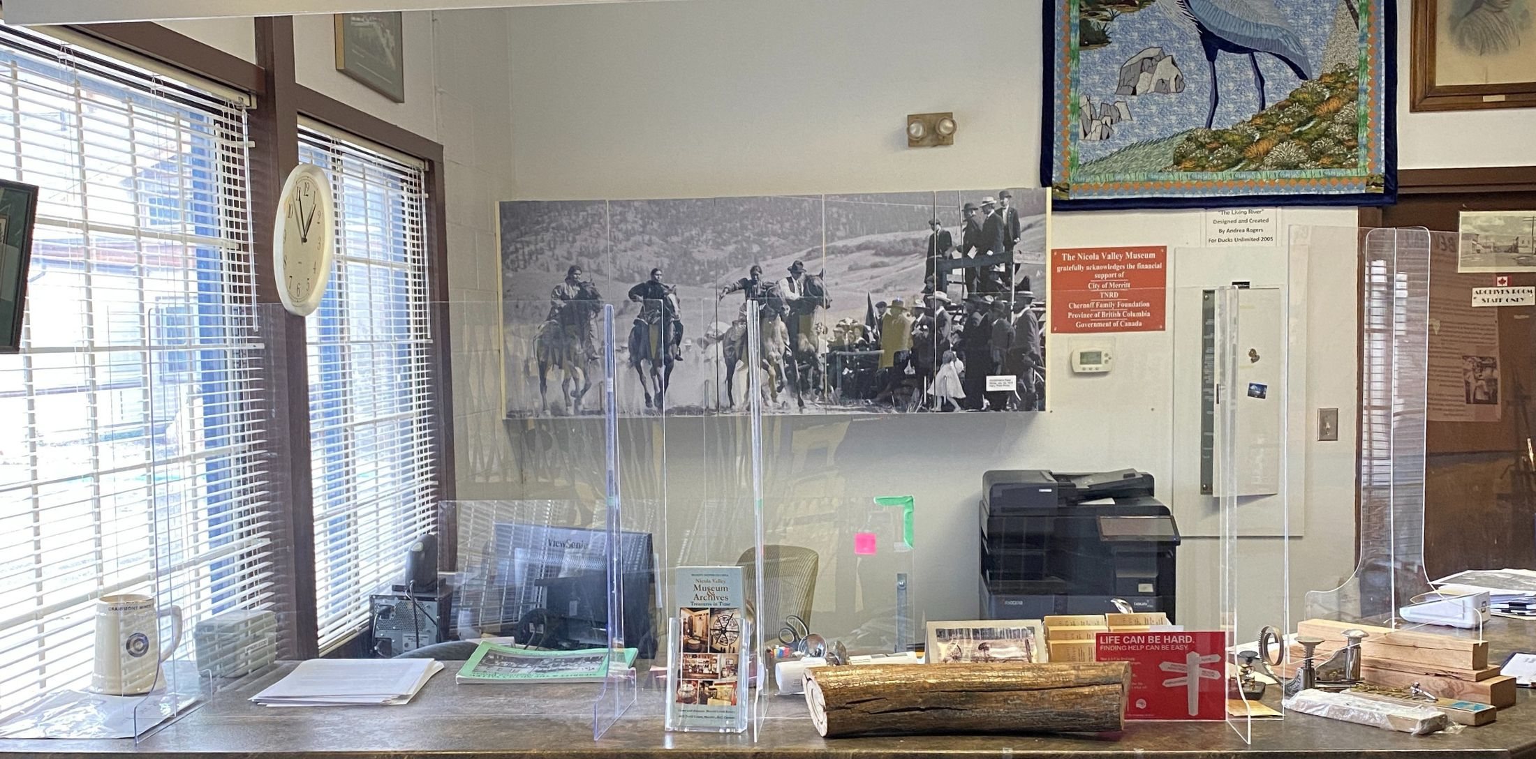 Ranching display with historic photographs