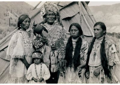 First Nations family in traditional clothing, historic photograph