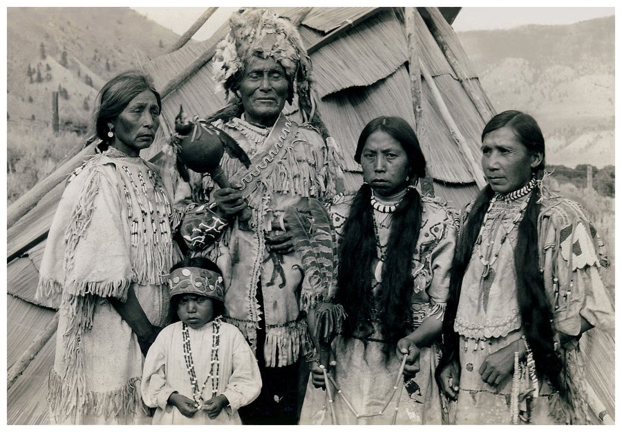 First Nations family in traditional clothing, historic photograph
