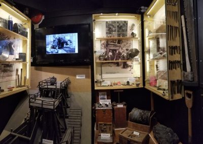 Mining display with tools, models and photographs